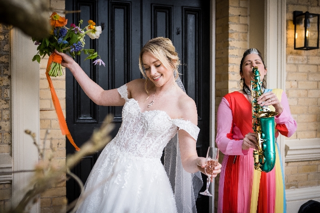 Bride dances to Lucy Harvey's sax music